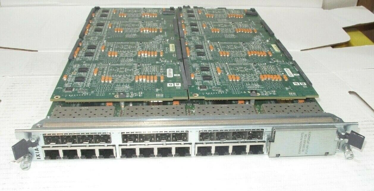 IXIA OPTIXIA LSM1000XMV12-01 12 PORT DUAL-PHY (RJ45 + SFP) 10/100/1000 MBPS ENET