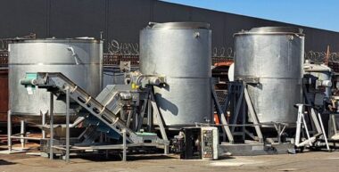 Two 1500 gallon tipping steam jacketed cookers and 1500 gallon cooling tank