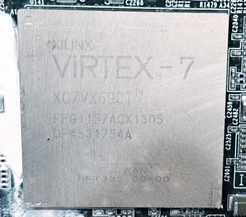 LOT OF 36 XILINX VIRTEX 7 CHIPS FOR SALVAGE ON 9 BOARDS