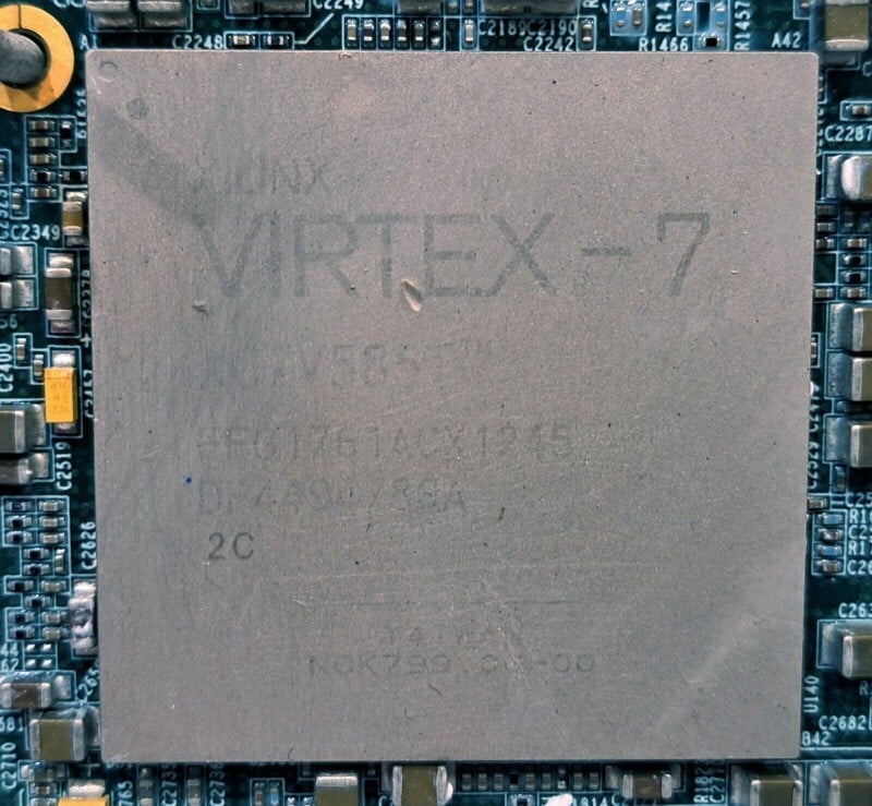 LOT OF 36 XILINX VIRTEX 7 CHIPS FOR SALVAGE ON 9 BOARDS