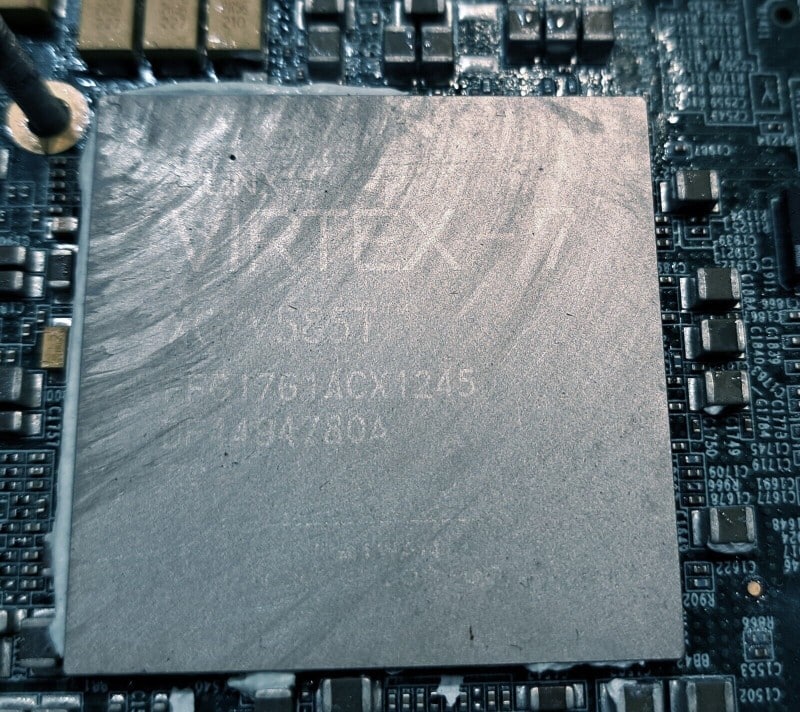 LOT OF 36 XILINX VIRTEX 7 CHIPS FOR SALVAGE ON 9 BOARDS