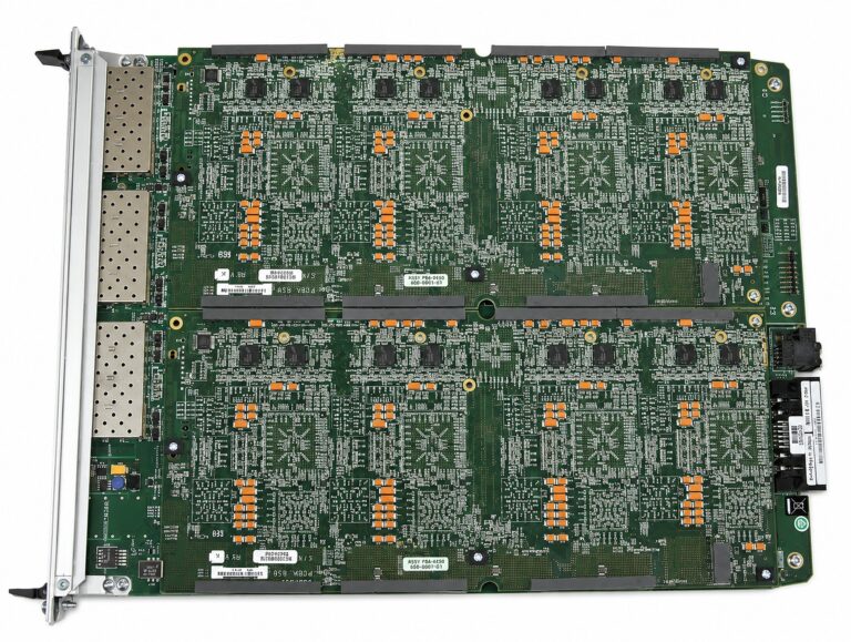 Top-down view of a refurbished Ixia Xcellon-Ultra NP load module board showing the per-port CPU array behind its twelve dual-PHY ports
