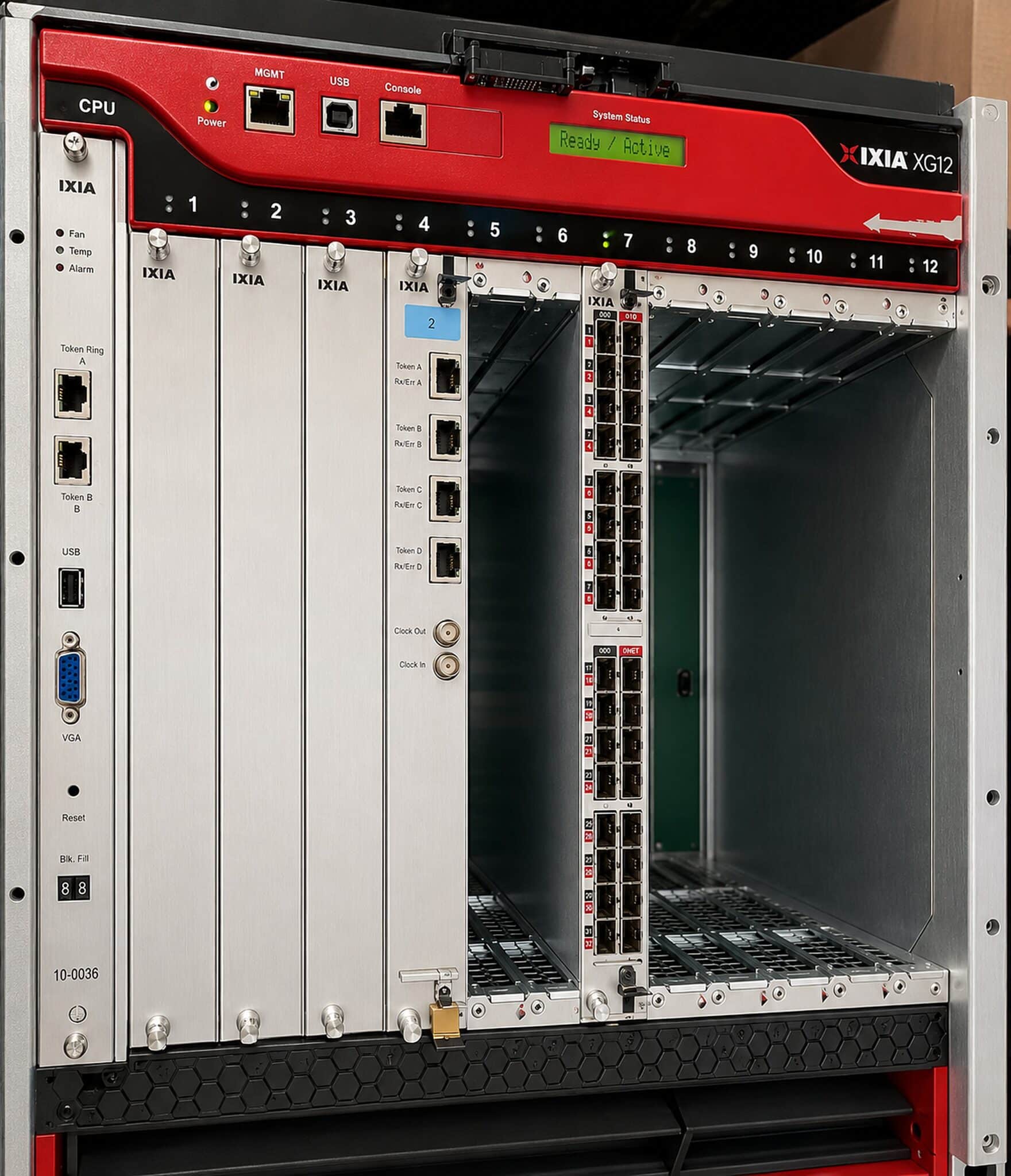 Ixia XG12 chassis front view with an XDM10G32S load module installed alongside the chassis CPU controller